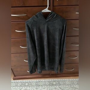 Men’s Levelwear golf long sleeve hoodie.